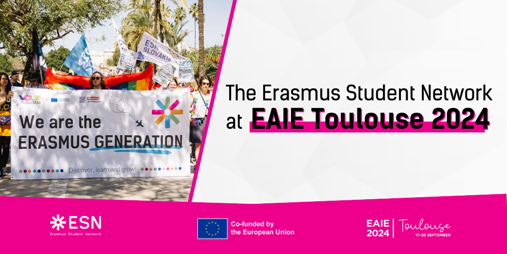 A group of volunteers holding the ¨We are the Erasmus Generation" banner