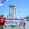 A group of people with colourful flags in front of Pasetto in Ancona, Italy,