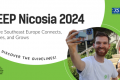 A volunteer holding a phone and ready to do a selfie during the South Eastern European Platform Nicosia 2024 event.