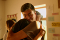Two people hugging